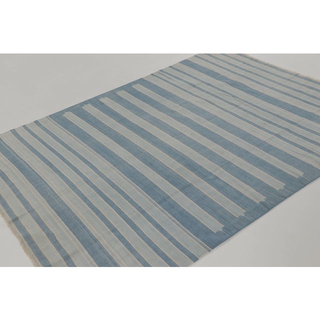 This 5x7 vintage Dhurrie rug is an exciting new curation from Rug & Kilim’s latest acquisition of rare and exemplary mid-...