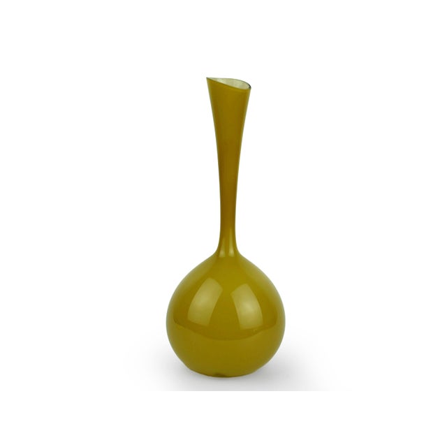 This exquisite mid-century modern "bottle" vase is a quintessential example of 1950s Scandinavian art glass, designed by...