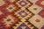 Add a touch of elegance to your home with this casual chic hand woven Tribal Kilim wool rug. Constructed on a loom by...