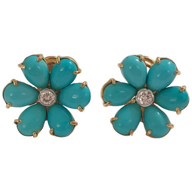 Christina Addison Elegant Turquoise Flower Earring is set in 18kt Yellow Gold with a Diamond Center set in Platinum. The...
