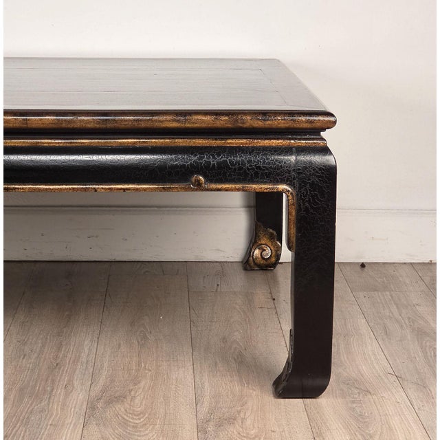 A vintage Beijing coffee table by Gregorius Pineo. Great carving and decoration.