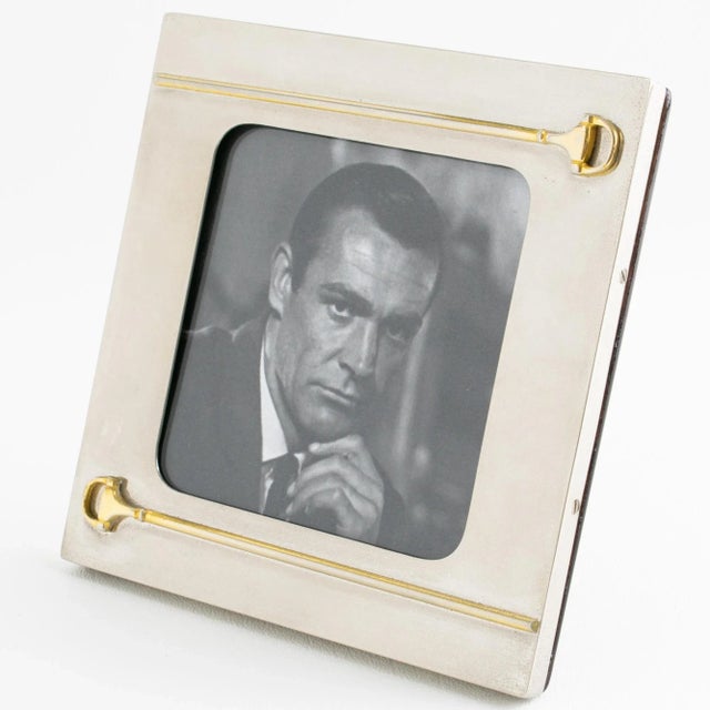 Incorporate a hint of classical elegance into your private interior with this exquisite Gucci-designed picture frame, a...