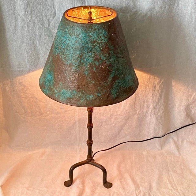 Forged Iron three leg lamp with pierced copper shade.