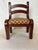This charming chair form doorstep has a hand stitched seat in a chevron pattern. Heavy enough to hold a typical interior...