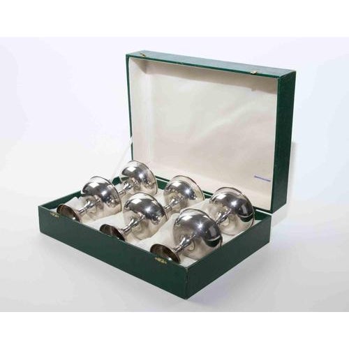 An elegant set of six Italian silver champagne coupes or dessert goblets, crafted in a refined mid-century style with...
