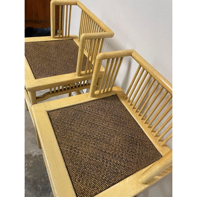 Soft butter color in these reproduction Chinese chairs, circa 1990. Traditional reed mat seat is solid as a rock. Great as...