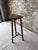 Charming vintage demi-lune stool featuring beautifully turned barley twist legs and matching stretcher supports, crafted...