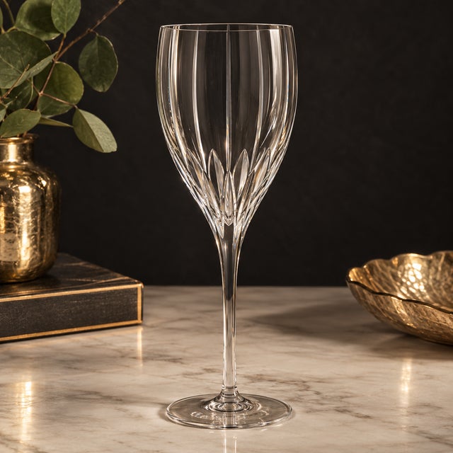 Stunning vintage Mikasa glass in the Phoenix Pattern. This elegant pattern features sleek vertical cuts and a smooth,...