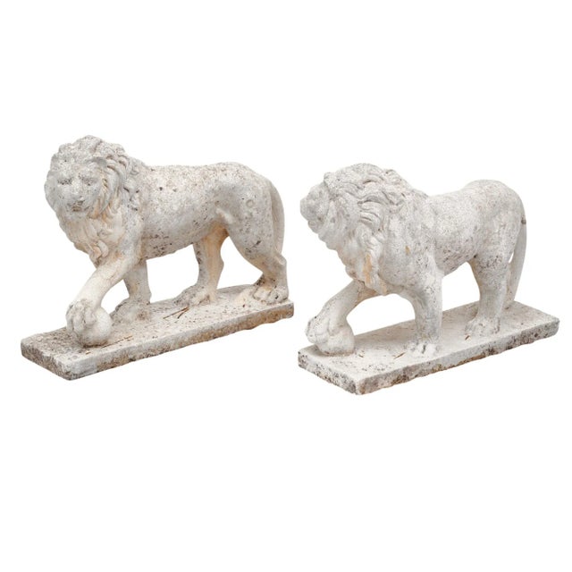 Pair of sculptures from the Art Deco period in France. Each is sculpted into the shape of a lion, featuring one...