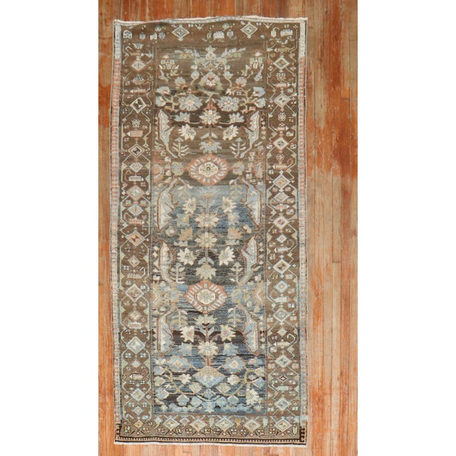 An early 20th Century predominantly Brown Persian Kurd Rug Details rug no. j3268 size 4' 3" x 8' 7" (130 x 262 cm)