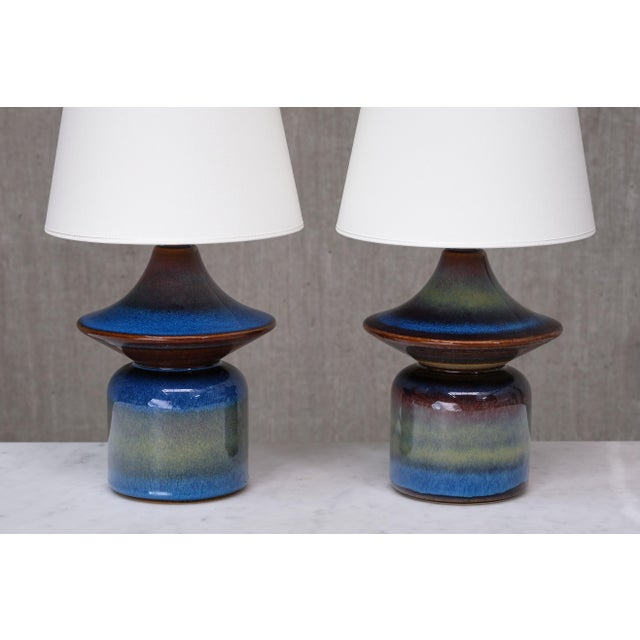 This rare pair of ceramic table lamps was designed by Einar Johansen and produced by Søholm Stentøj in Denmark during the...