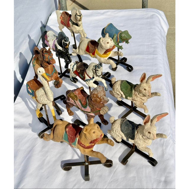 Step right up — a complete vintage 1992 folk-art carousel menagerie, ready to display as a group or as twelve individual...