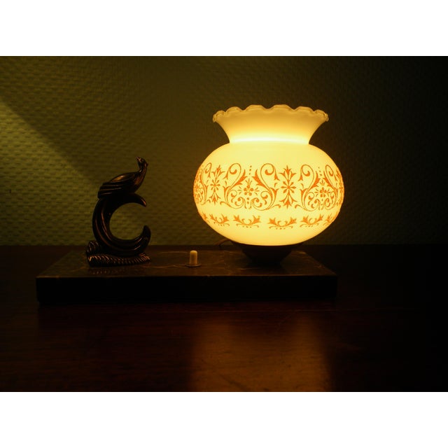 Table lamp from the 1940s, Art Deco style. The base is made of veined marble (21.5 x 8 cm) with a white switch, upon which...