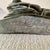 Tribal Inuit Soapstone Carving by Lucassie Amm – Signed - Kneeling Inuk Figure For Sale - Image 3 of 18