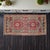 This exquisite hand-knotted small rug from the 1960s showcases the vibrant artistry of the Chal region in Denizli. Its...