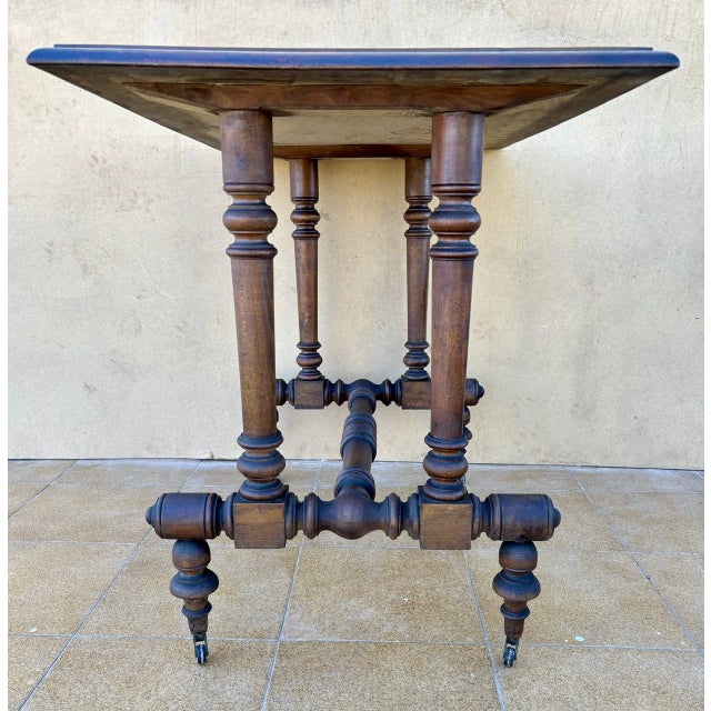 19th Century Victorian Walnut Table with Turned Base and Castors For Sale - Image 11 of 12