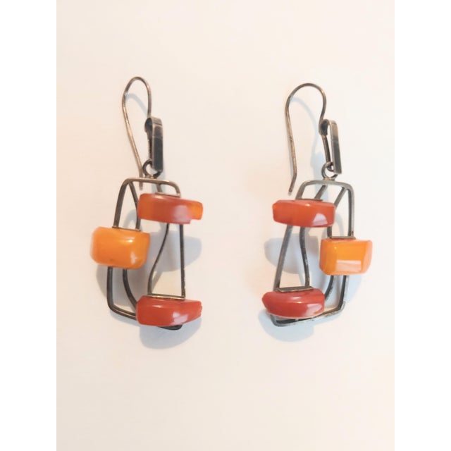 Here's a fine example of Soviet Union Modernist style earrings circa 1960s. Each wire bears maker's mark and 875 Hammer &...