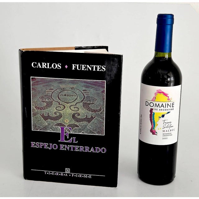 Offered is a rare find 1st edition Spanish language hardcover of Mexican author Carlos Fuentes's "El Espejo Enterrado",...