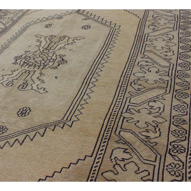 Textile Vintage Cream and Charcoal Turkish Oushak Rug With Stylized Medallion Design For Sale - Image 7 of 9