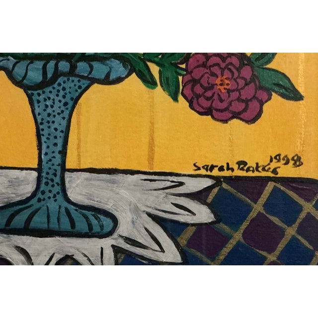 Self-taught artist Sarah Rakes was born in Bentonville, Arkansas in 1955. This is a vibrant, contemporary folk art...