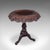 This is an antique carved lamp table. A Burmese, octagonal teak colonial table, dating to the mid Victorian period, circa...