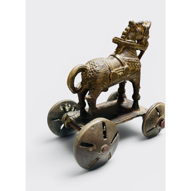 Early 20th Century iron American Indian functional mobile horse. Impressive ironwork carving on horse and distinctive...