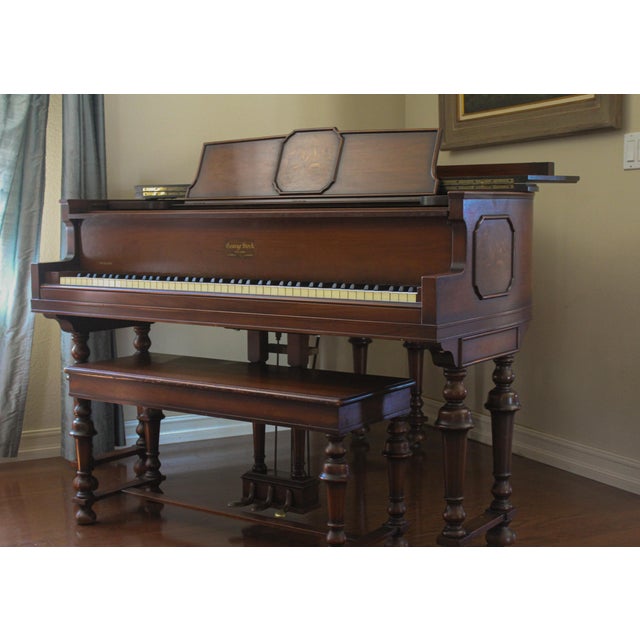 Early‑1930s George Steck & Co. petite baby grand piano (4′9″), New York–made, featuring an elegant inlaid wood cabinet...