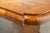 Large English Art Deco dining table on two pedestals, crafted from honey-colored walnut burl. The table disassembles into...