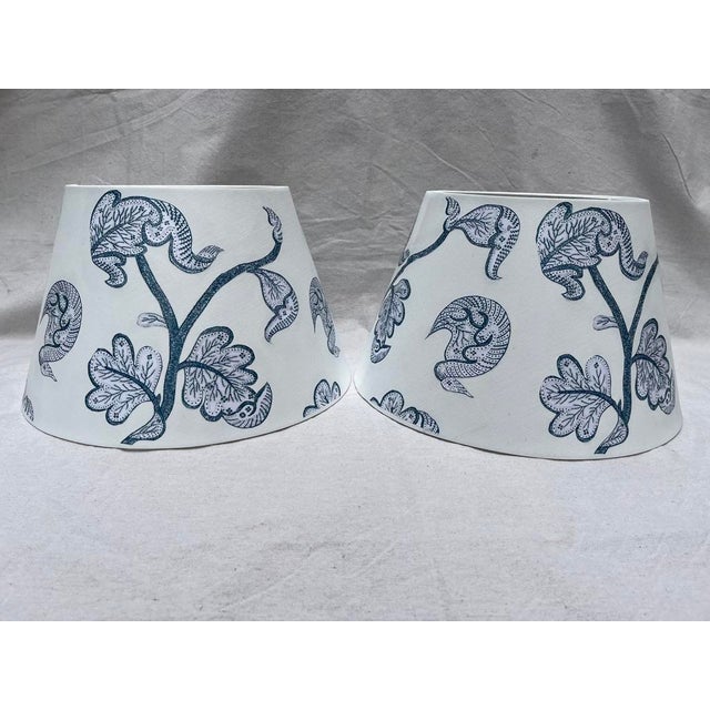 A matching pair of one of a kind hand made decoupage empire lamp shades. The Albert Hadley inspired blue and white foliate...