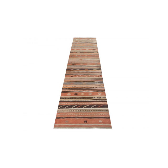 Handwoven vintage kilim rug from Denizli region of Turkey. Approximately 50-60 years old. In very good condition.