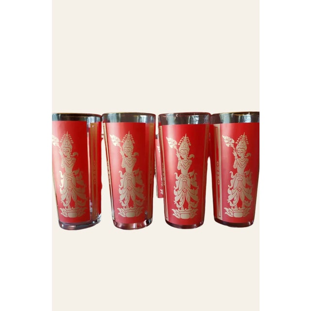 Vintage Culver Thai Goddess highball glasses featuring iconic 22K gold detailing and rich red panels—one of the most...