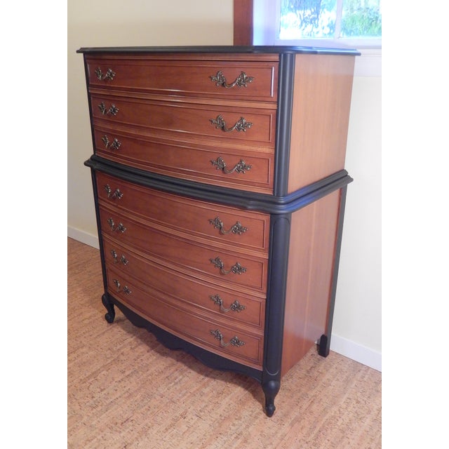 Striking French Provincial dresser that has been hand-crafted by the Dixie furniture company, renown for their high...