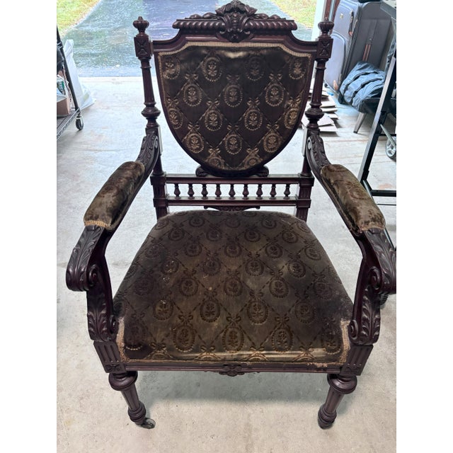 Stained Louis XIV dining room table chairs covered with padding and velvet. Made in the late 19th to 20th centry circa...