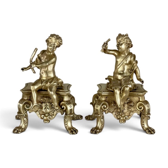 This remarkable pair of early 19th century French bronze doré statues depicts two musical cherubs modeled with lively...