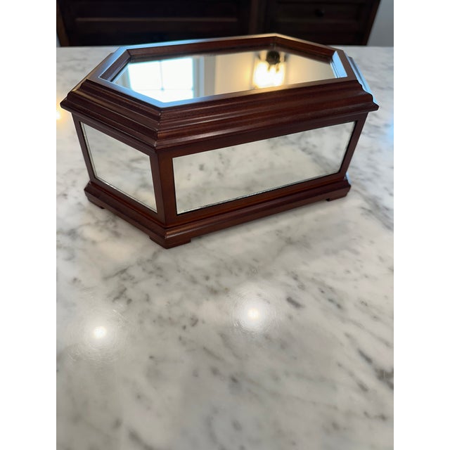Bombay Company wood mirrored jewelry box. Purchased around 2006. Removable top tray has two compartments on one side, and...
