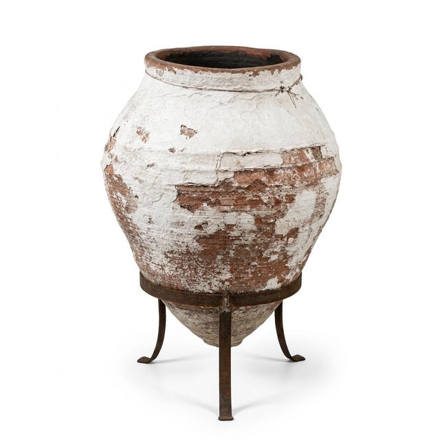 This authentic Greek "Pithos" jar, dating back to 1930, is a stunning example of Mediterranean utilitarian artistry. Hand-...