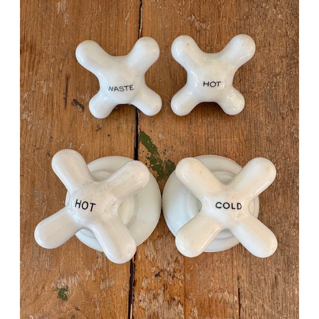Porcelain vintage ceramic hot & cold (plus one marked waste) control knobs for bathroom faucet size is approx. 3 1/4" x 2"