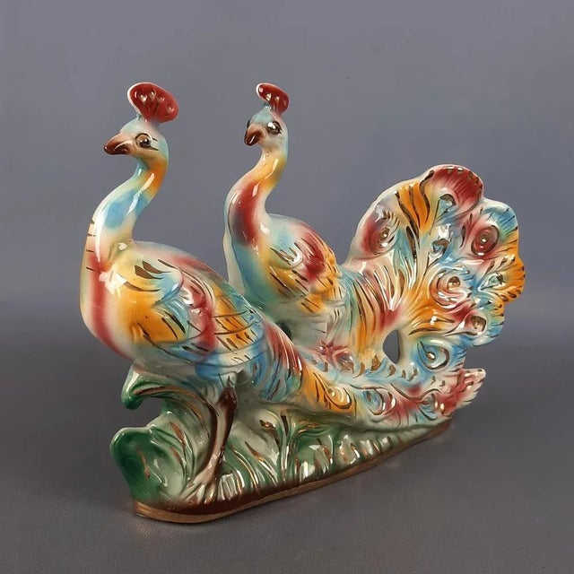 Beautiful vintage ceramic sculpture, depicting a pair of multicolored peacocks with pure gold details. Excellent Italian...