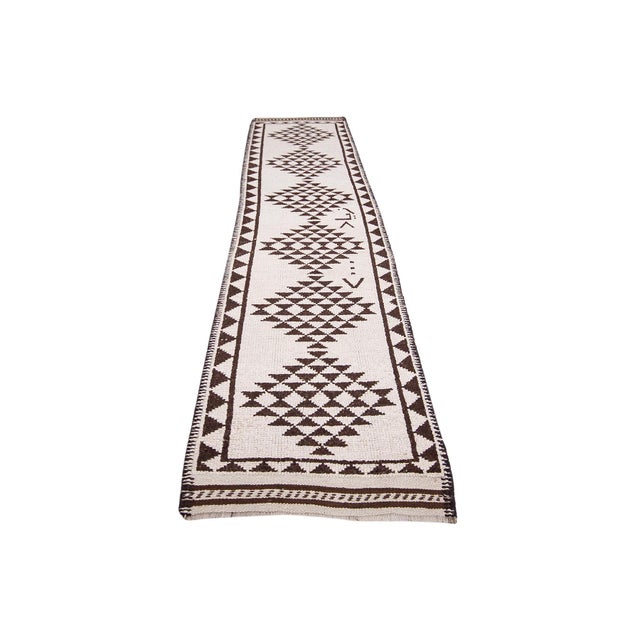 Vintage handknotted neutral runner rug from Northern Iraq. Approximately 45-55 years old. In very good condition.