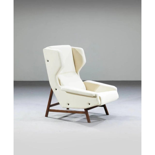 Gianfranco Frattini for Cassina, lounge chair, model 877, fabric, teak, Italy, 1959 This grand lounge chair is based on a...