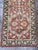 Design Plus Gallery presents a 2ft 6in x 9ft 1in Traditional Floral Wool Runner Rug. It has a terracotta-red field framed...