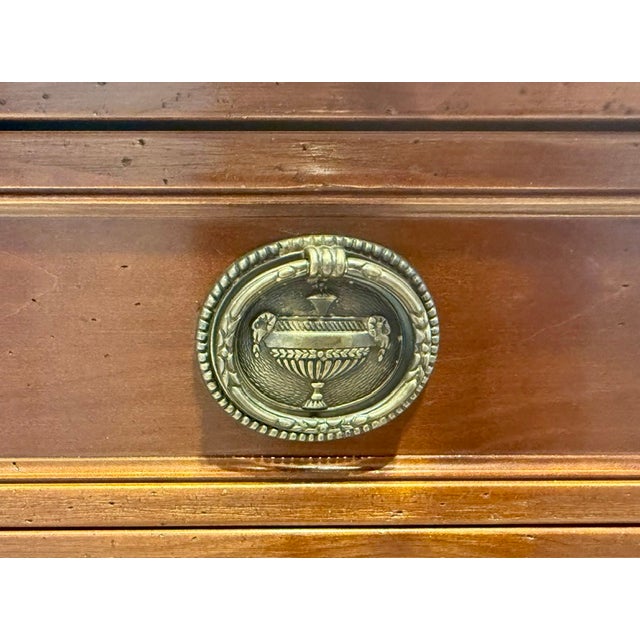 Capture the timeless elegance of classic European craftsmanship with this stunning vintage GEKA sideboard. Masterfully...