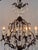 1950s Iron and Crystal Chandelier With Scrolled Frame For Sale - Image 5 of 7