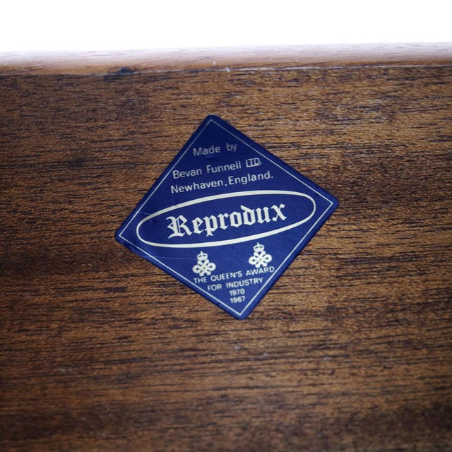 Pair of bedside tables in mahogany with leather top from bevan funnell. Military campaign style from the 1960s with...