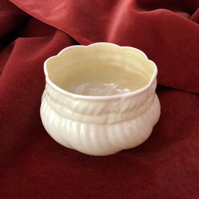 Vintage fine china ivory color sugar bowl with ribbon and bow design , 3"D X 2.25"H , Makers mark reads " Belleek Made in...