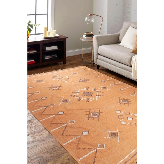 Fiona Penelope Coral Flatweave Rug, Country of Origin: India. This exceptional flatweave piece showcases the sophisticated...