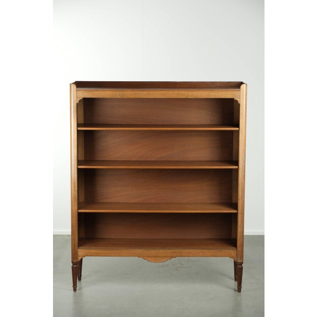 Antique English bookcase/chest of drawers from the late 19th century with a beautiful appearance in a subtle size. This...