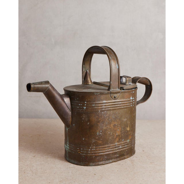 A lovely watering can from the late Victorian or Edwardian era with a gorgeous natural patina. I love the the hints of...