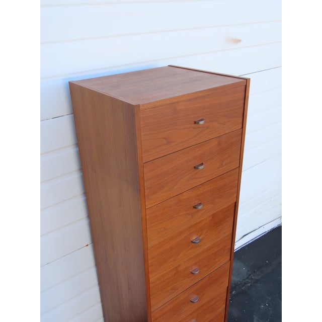 This Lingerie Chest is made out of wood, solid wood, walnut or teak veneer, and metal. This Lingerie Chest has Mid Century...