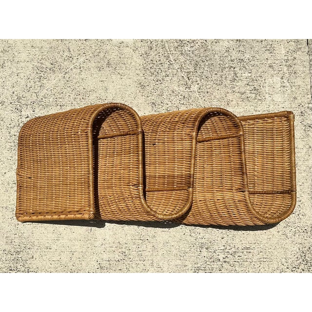 Celebrate the warmth and craftsmanship of mid-century design with this vintage woven rattan wall sculpture. Expertly...